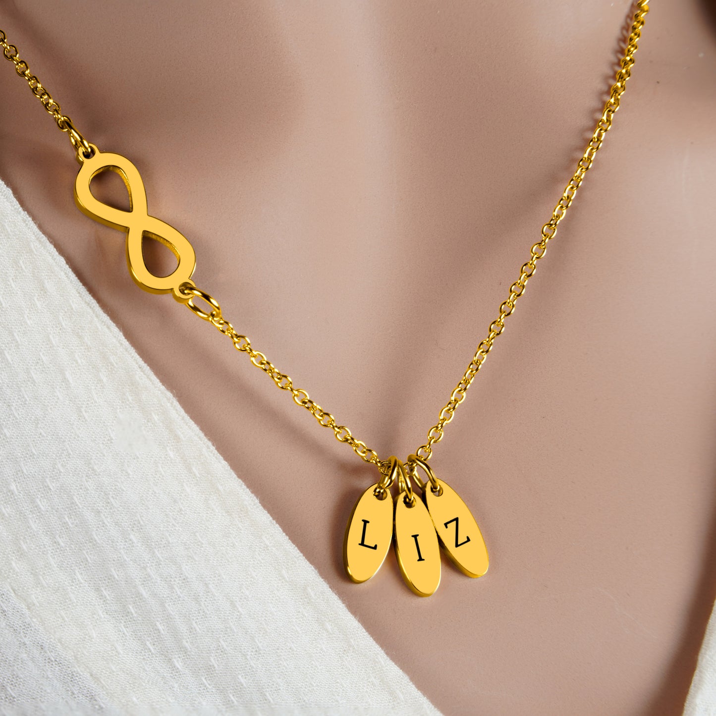 Infinity Pendant (17mm x 7mm x 1.5mm) 3 x Oval Pendants ( 12mm x 5mm x 1.1mm thick) On a 18K Vermeil Necklace